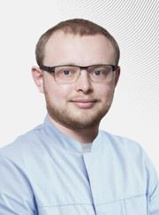 Имплантолог, стоматолог Евгений Михайлович Басин