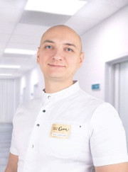 Имплантолог, стоматолог-хирург Владимир Александрович Байцеров