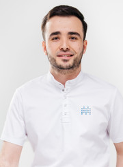 Стоматолог-ортопед Хусрав Мухаммадович Комилов