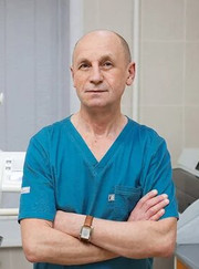 Стоматолог, стоматолог-ортопед Игорь Ефимович Захаренко