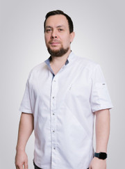 Имплантолог, стоматолог-ортопед Андрей Сергеевич Дюженко
